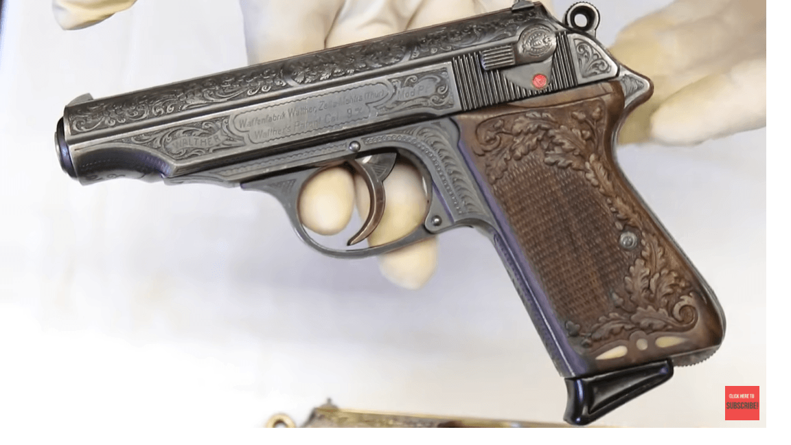 and-another-engraved-9mm-with-a-custom-grip.png
